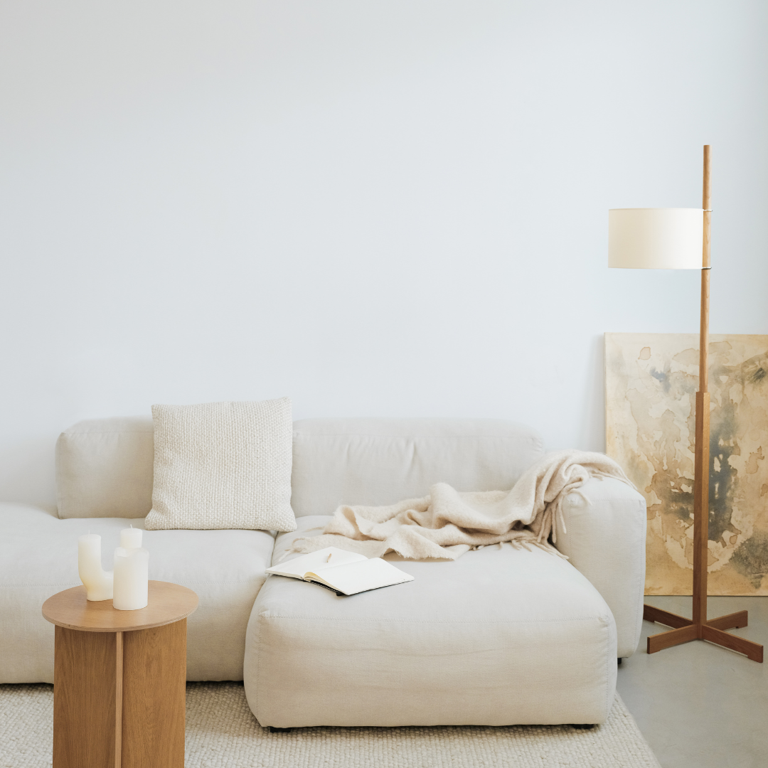 A clean, minimalist room with simple furniture